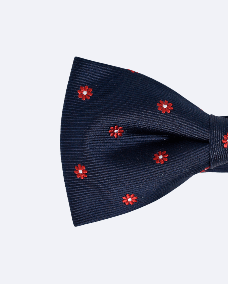 Pajarita azul marino con flores rojas de seda jacquard