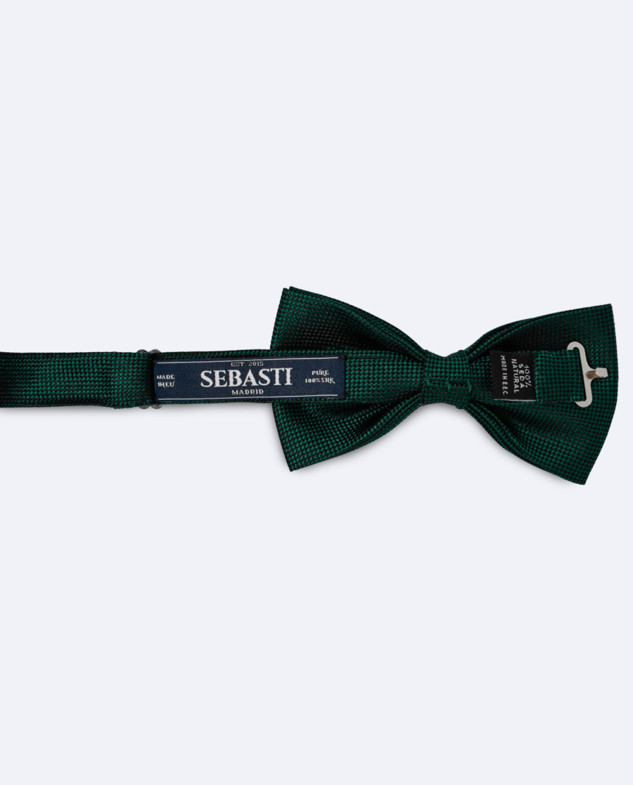Vista trasera de la pajarita verde oscuro de seda jacquard, con cinta ajustable y marca Sebasti en la etiqueta