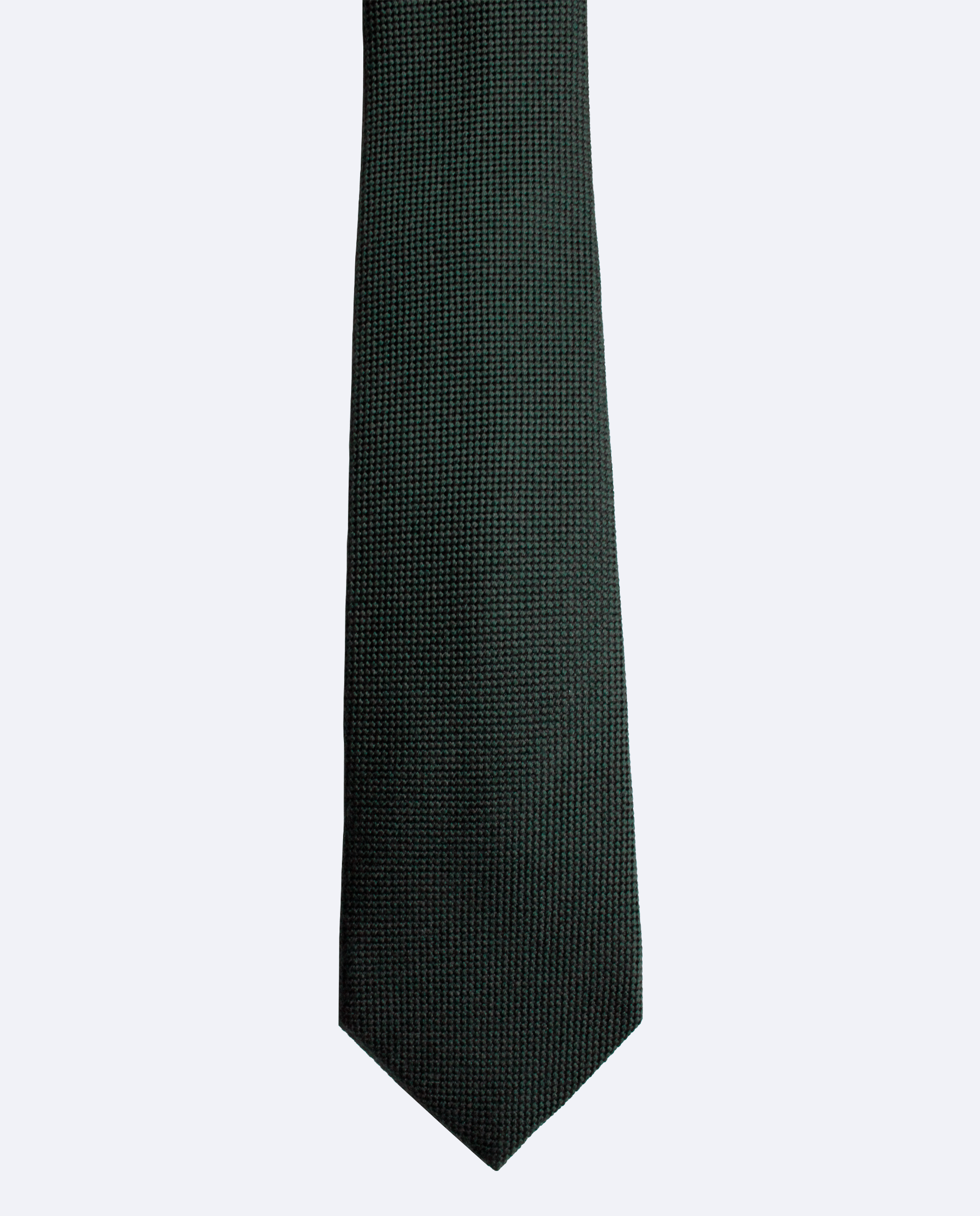 Corbata verde oscuro con tejido granulado de tonos verde oscuro. Confeccionada en 100% lana italiana, vista frontal