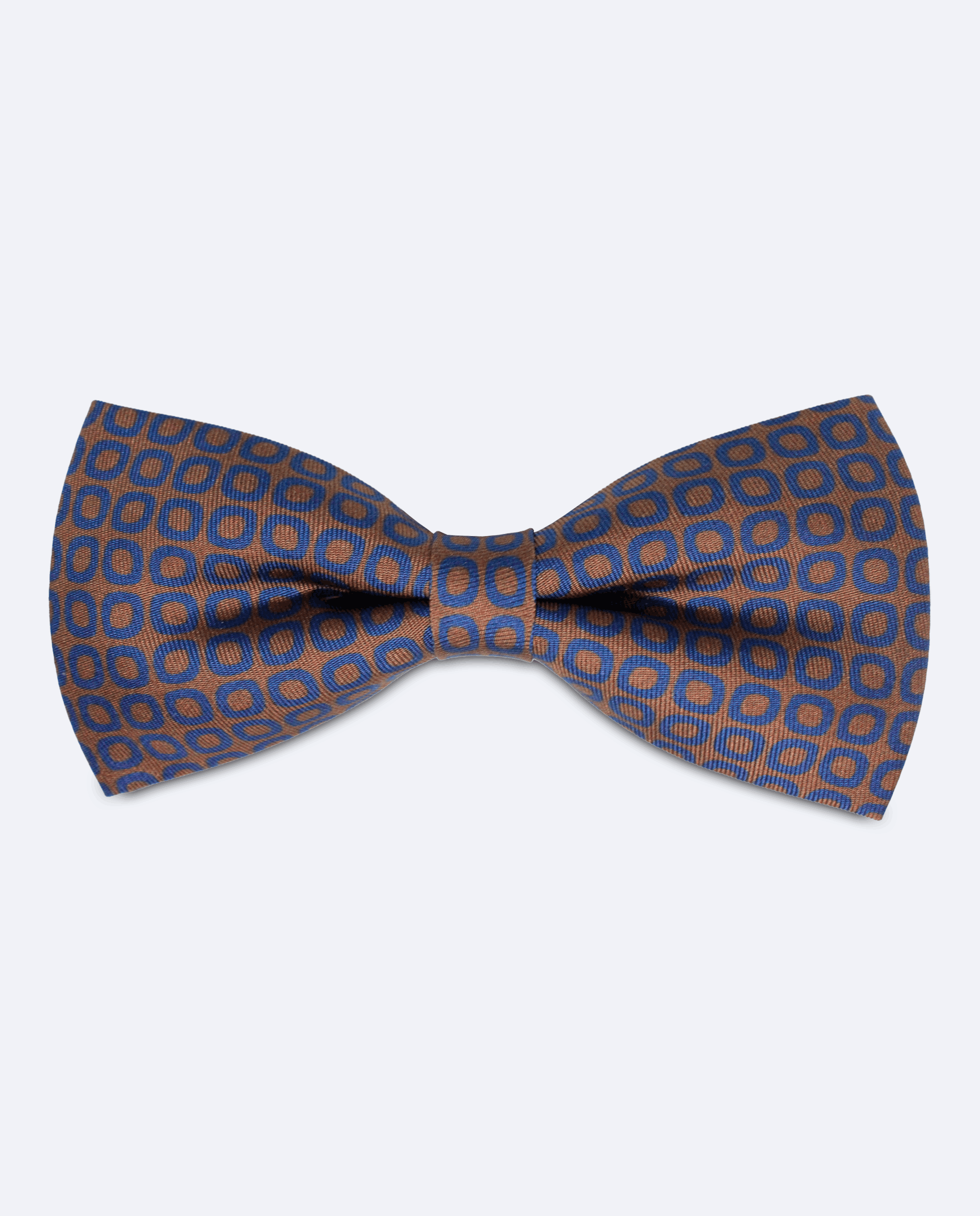 Pajarita marrón con diseño ovalado azul cobalto, hecha a mano en 100% seda italiana, vista frontal