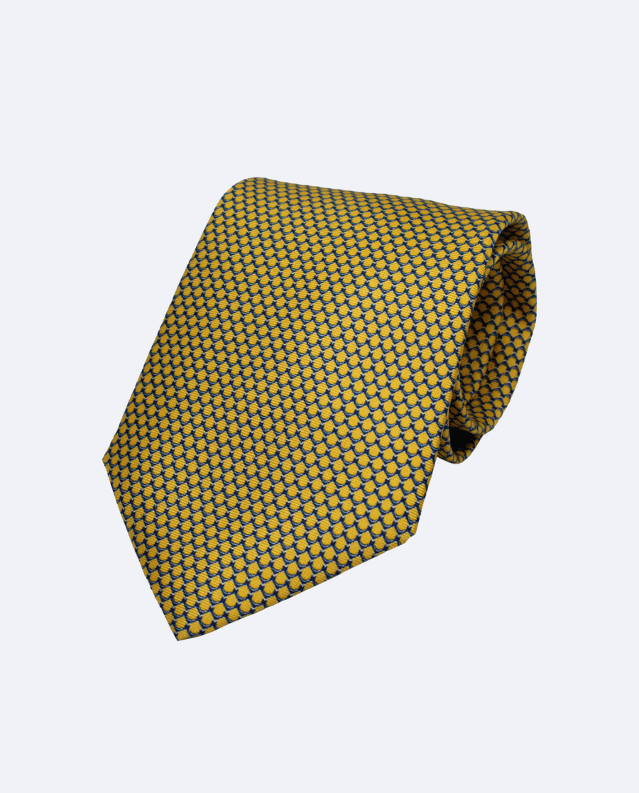 Corbata de seda amarilla y azul marino con diseño geométrico