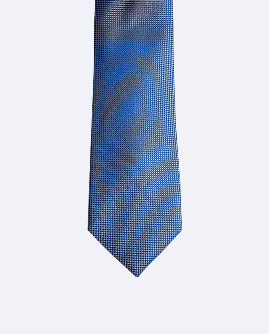 Corbata de seda azul con microrombos blancos