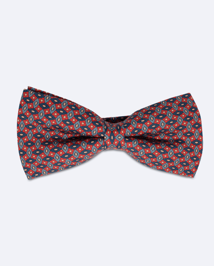 Pajarita azul y rojo con mosaico geométrico
