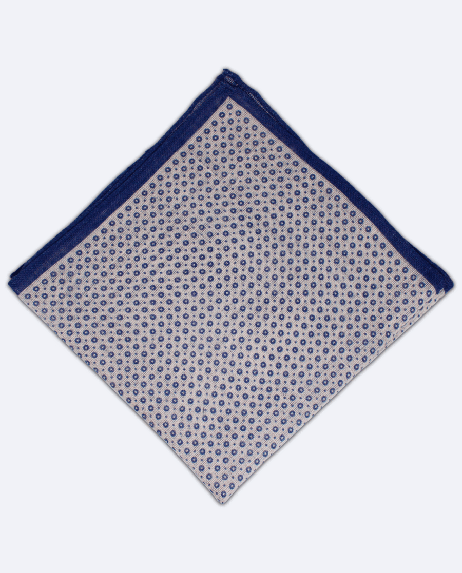 Pañuelo de bolsillo azul marino con círculos azules