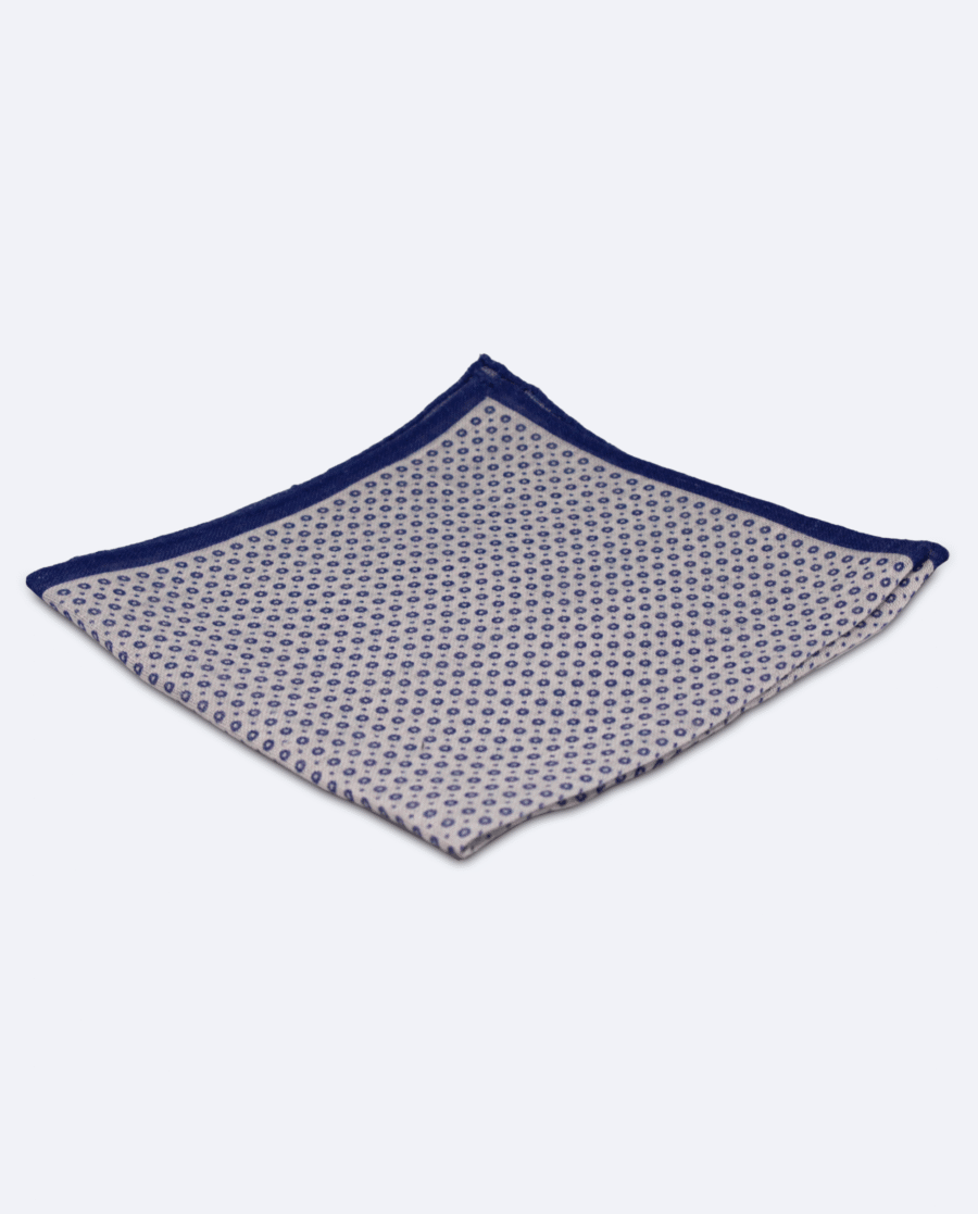 Pañuelo de bolsillo azul marino con círculos azules